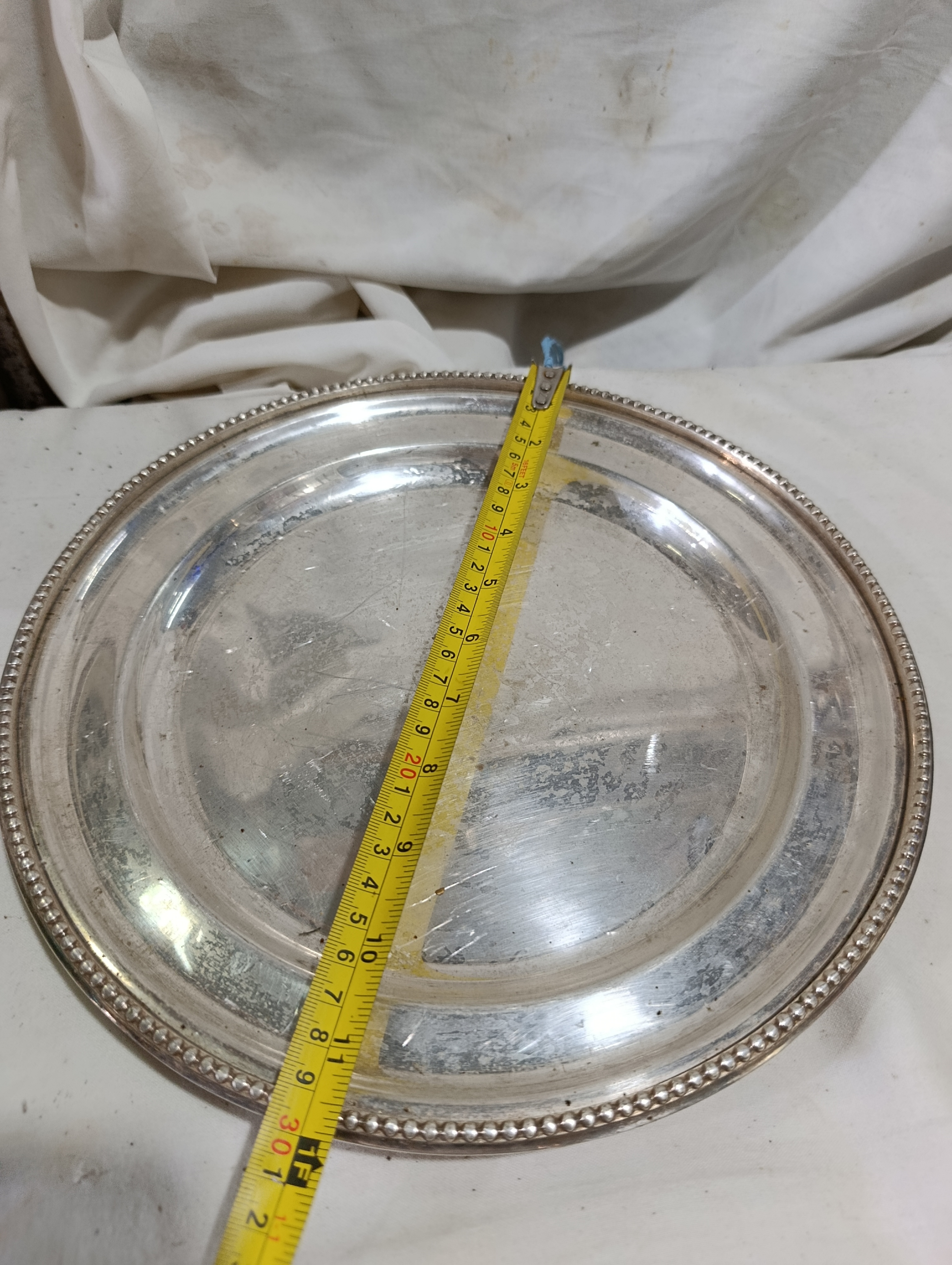Plato medal blanco con baño de plata